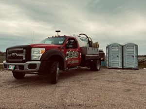 Red truck grey toilets